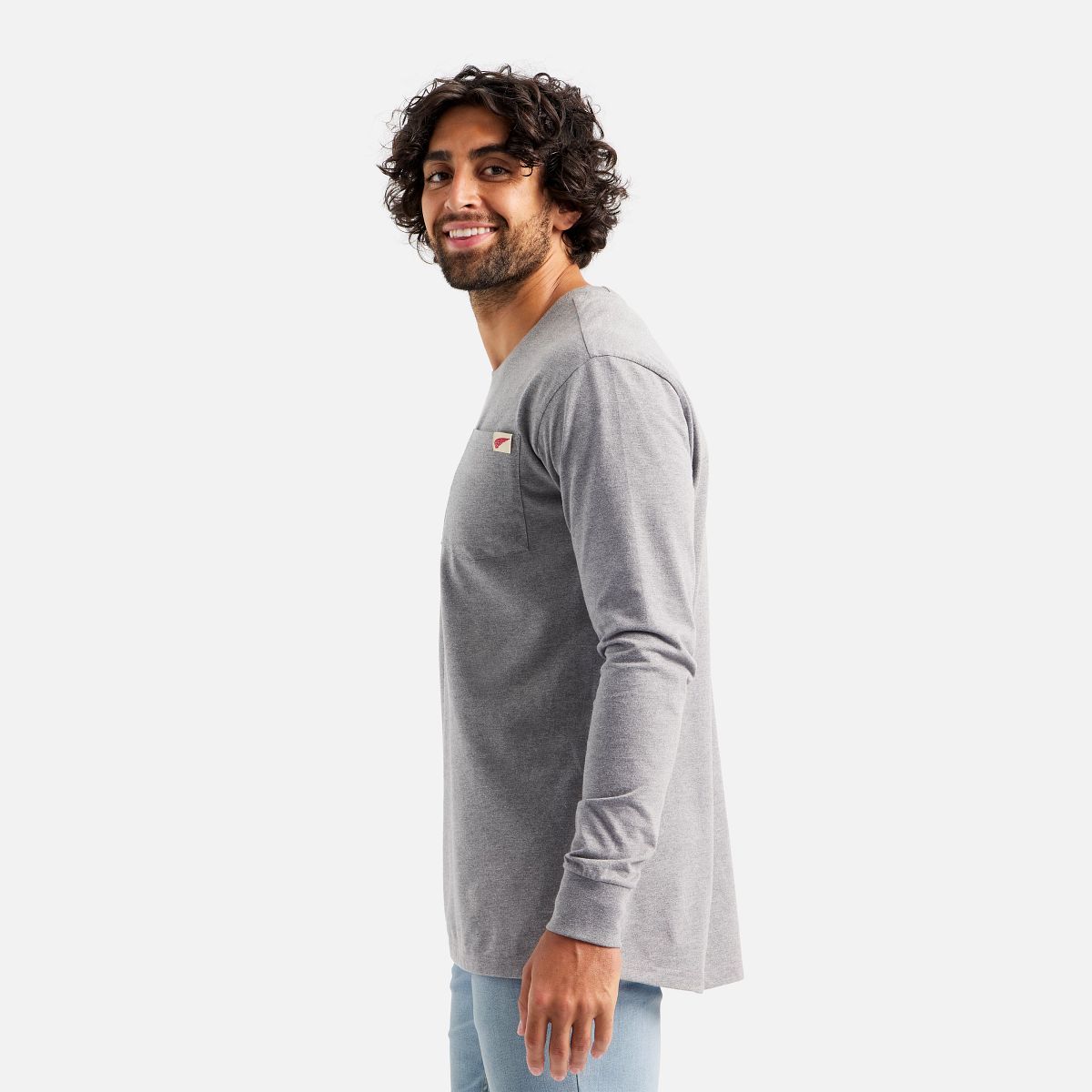 Camiseta com Bolso e Estampa nas Mangas